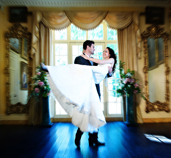 C0001 1. A shot like this is great one to make your first on a cherish shoot for several reasons. Its uncomplicated, introduces and element of fun, relaxes your client, sets the scene and if your shooting a couple gets the guy involved. Shot using an Arri 300w combining tungsten with daylight.