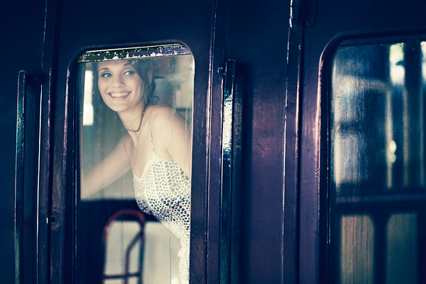 I started shooting a sequence of pictures through the glass of the carriage windows to evoke a sense of romance. The glass provides a barrier too, making our subject appear beyond reach.