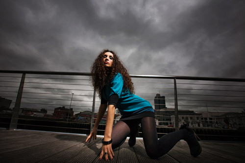 Lit with 1 Speedlight and -2 stops of exposure compensation for the background.