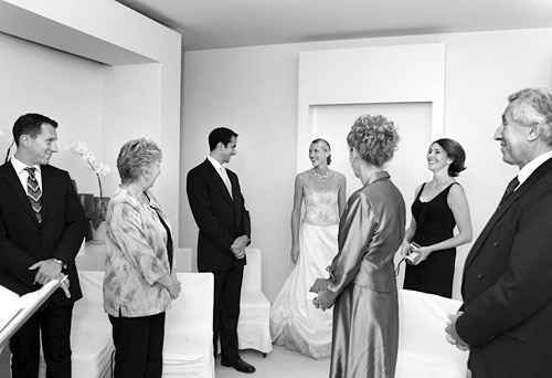 01_11 This is one of those shots you couldn’t set up even if you tried: the moment when the bride enters the ceremony room. Julie’s timing was crucial. The expressions, body language and design are all spot on. ISO 800 f/4 at 1/60th with hand held off camera flash.