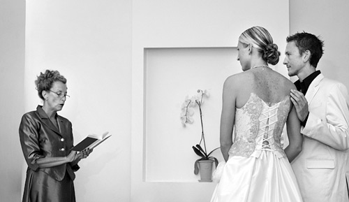 01_12 Another fine composition with a touch of tenderness against the cool, geometric background. ISO 800 f/4 at 1/60th
