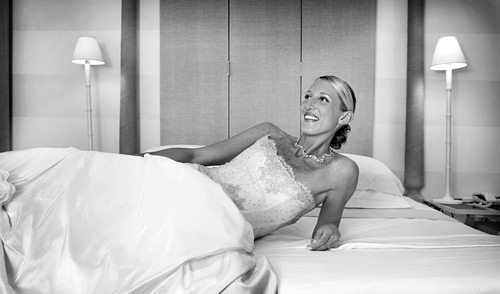 01_23 I shot this image of the bride using a splash of flash as the groom entered the room. The moment when their eyes met was the one not to miss. ISO 400 f/4 at 1/60th