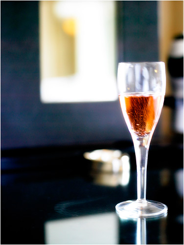 This image made a striking print and a big canvas. 1/8th second exposure on my Hasselblad with the lens wide open at f2.8 was needed to get just the right Champagne bubble and camera movement.