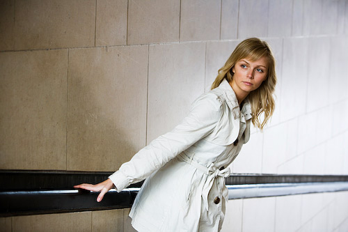 This shot combines simple lines, a strong diagonal pose, and natural light.  