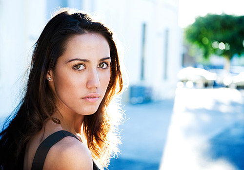 Late afternoon light and cool shadows give this over the shoulder portrait a colourful look.