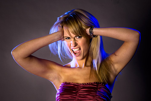 A pair of gelled up kick lights introduced a bit of colour to this image. All the shots so far have used spill light from the key to light the background.