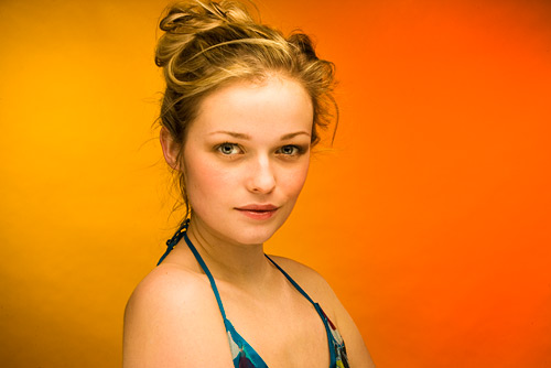 A rich gradient background was lit with two lights with a yellow and orange filters clipped on