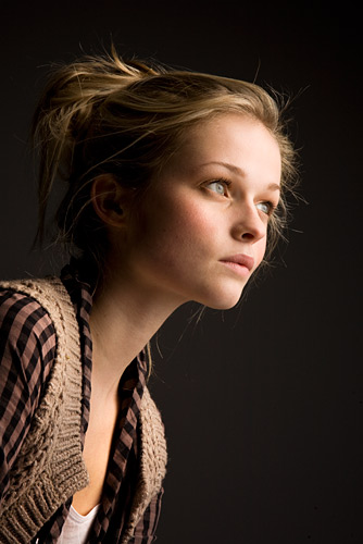 A single soft box and a white background is all you need to create this picture.