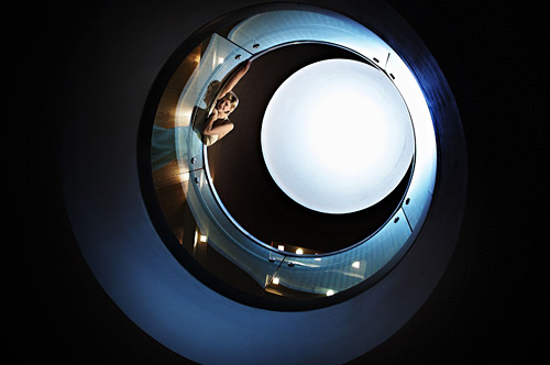 Chris used a Lowell ID light for this image. He shot it from the floor below with the camera looking straight up to the distant light dome in the ceiling.