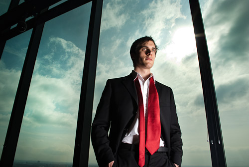 Here I pulled the background down and lit the groom with a striplight softbox on my Mobil kit. Shot on a Pentax K200D camera that I