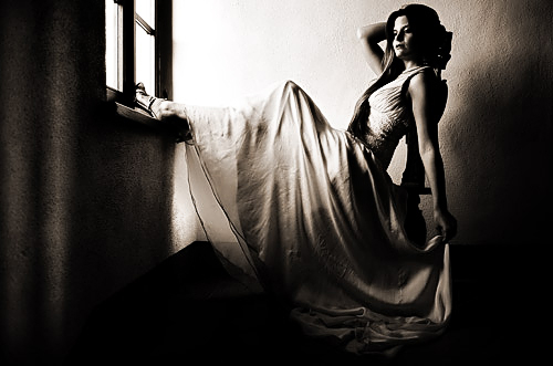Natural light. low key - 1 stop for dress detail