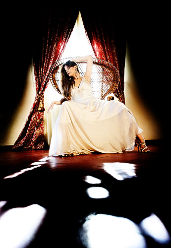 Backlit with sunlight coming through the windows and key lit with reflected tungsten light.