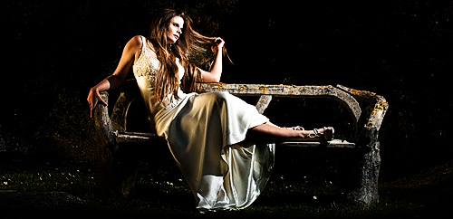 The keylight was provided by a Speedlight on a stand and the kick light was reflected sunlight.