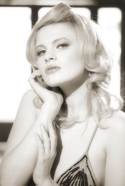 A characteristic of vintage style is in the placement of hands. Chloe had done her homework.